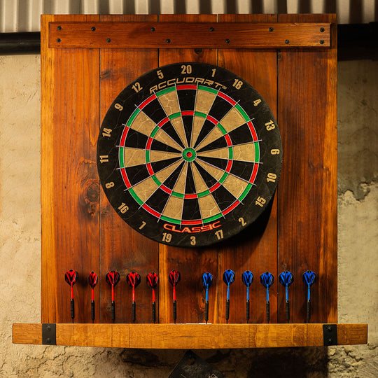 Reclaimed-wood dart backboard with mounted dartboard and 12 darts stored below.
