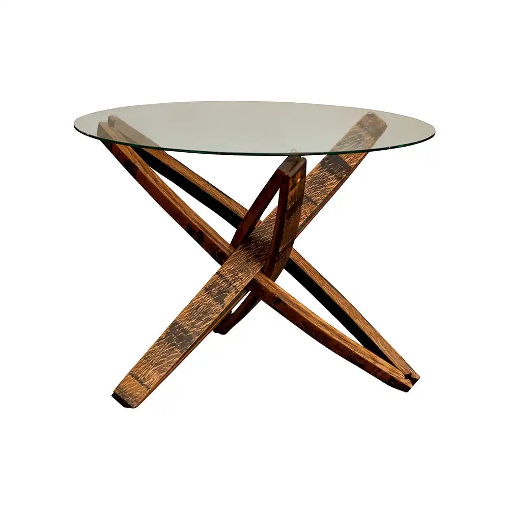 Round glass table with wooden crossbeam base on a white background