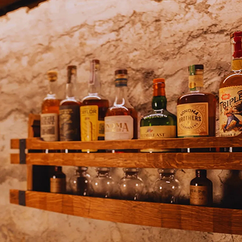 Rustic wood shelves with decor elements, symbolizing handcrafted design.